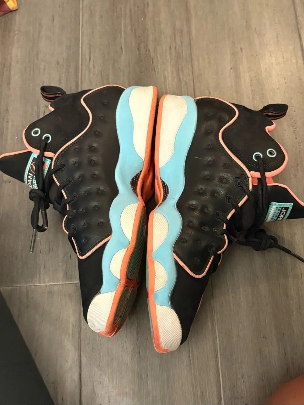 Jordan Black Sneakers with Coral Trim and Teal Logo Patch